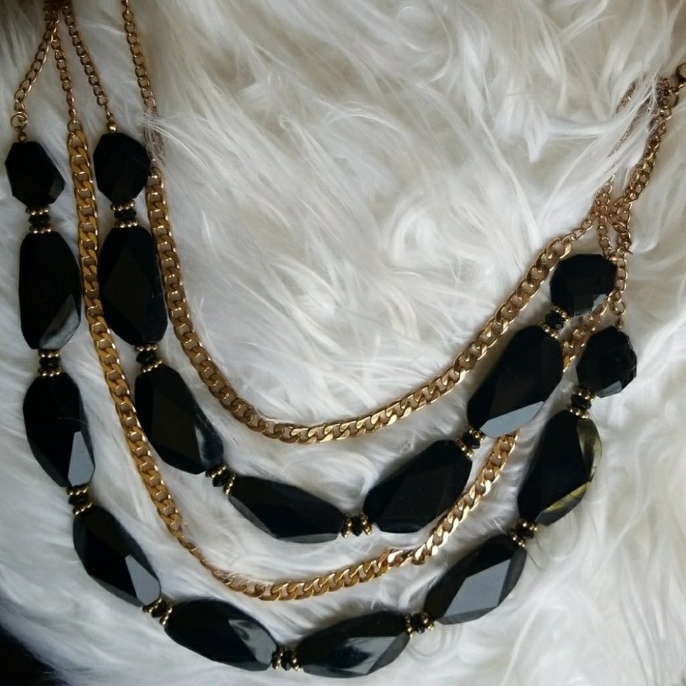 Black and golden chain statement necklace